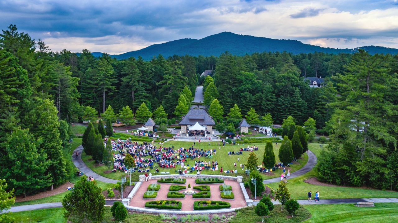 People gather for a concert in Longmeadow Park at The Ramble Biltmore Forest.