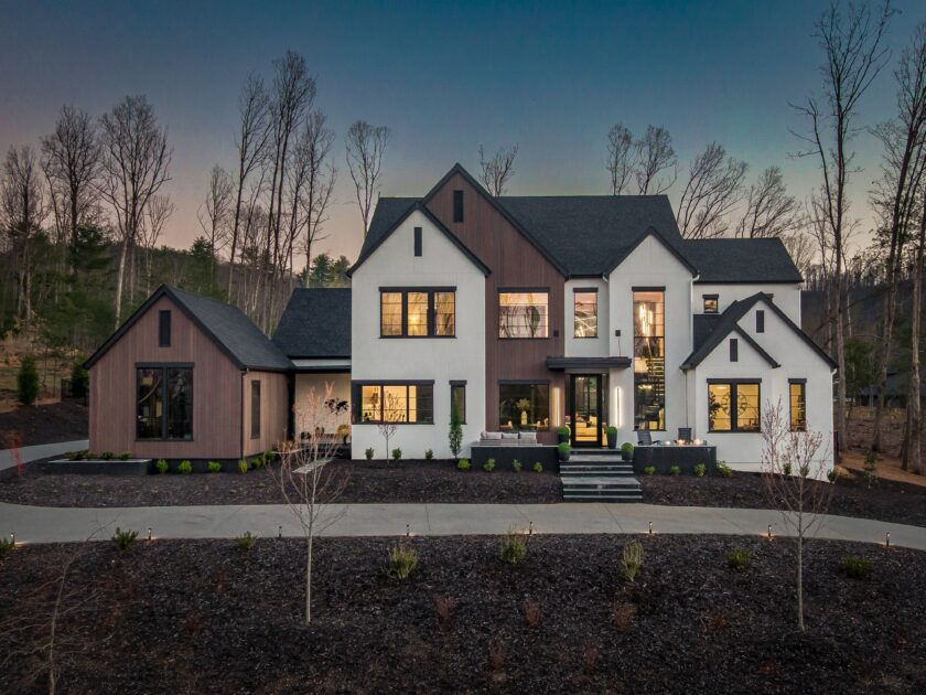 Exterior of home in The Ramble Biltmore Forest at sunset.