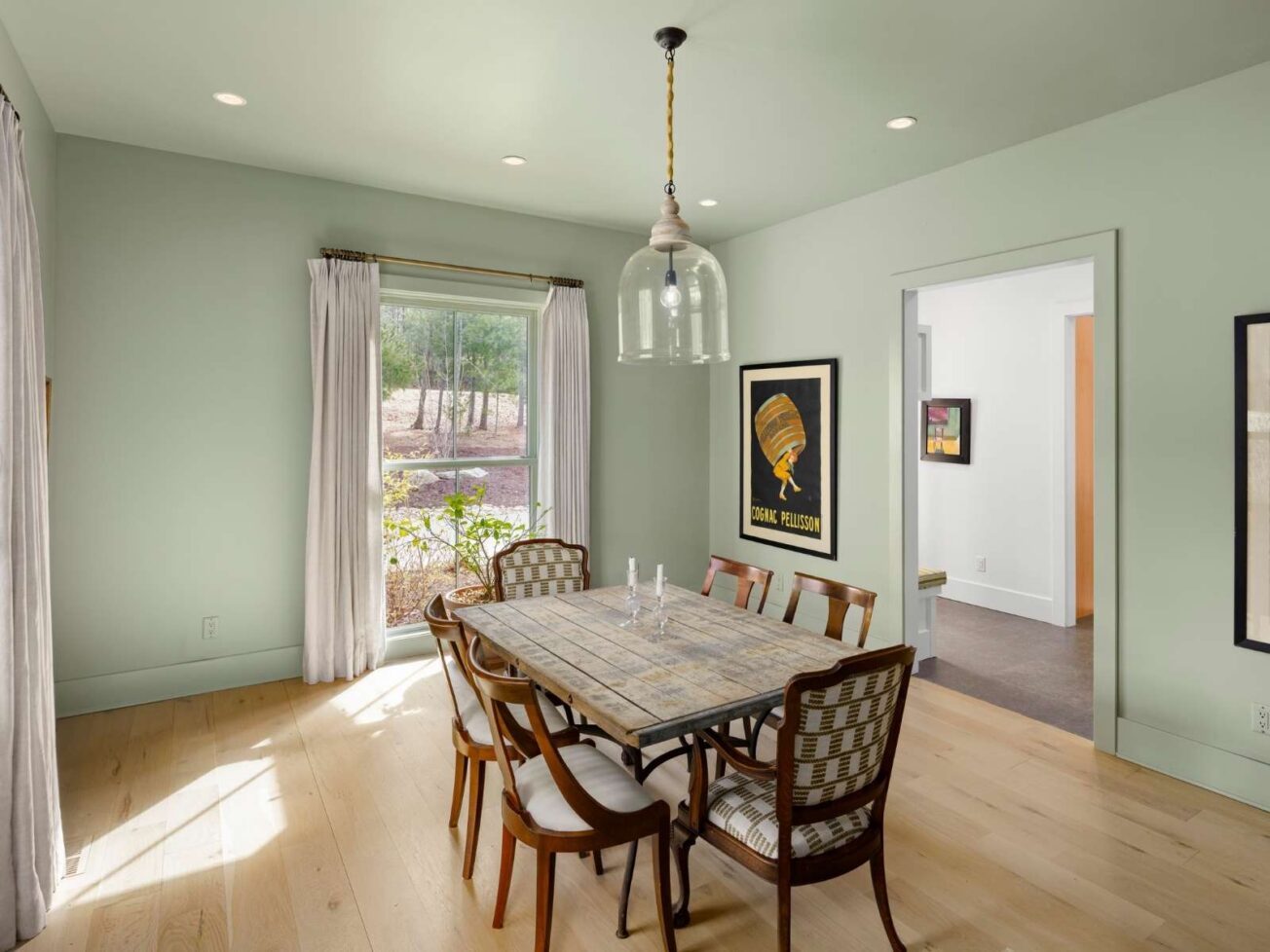 Dining room inside home at The Ramble Biltmore Forest.